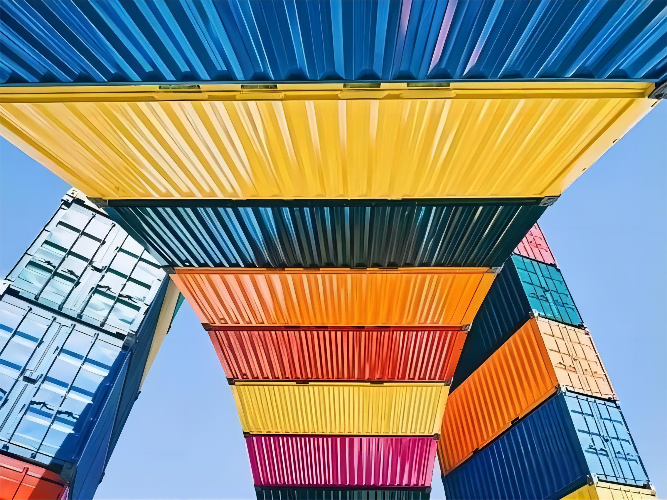 Forklift moving goods into a shipping container for FCL shipment