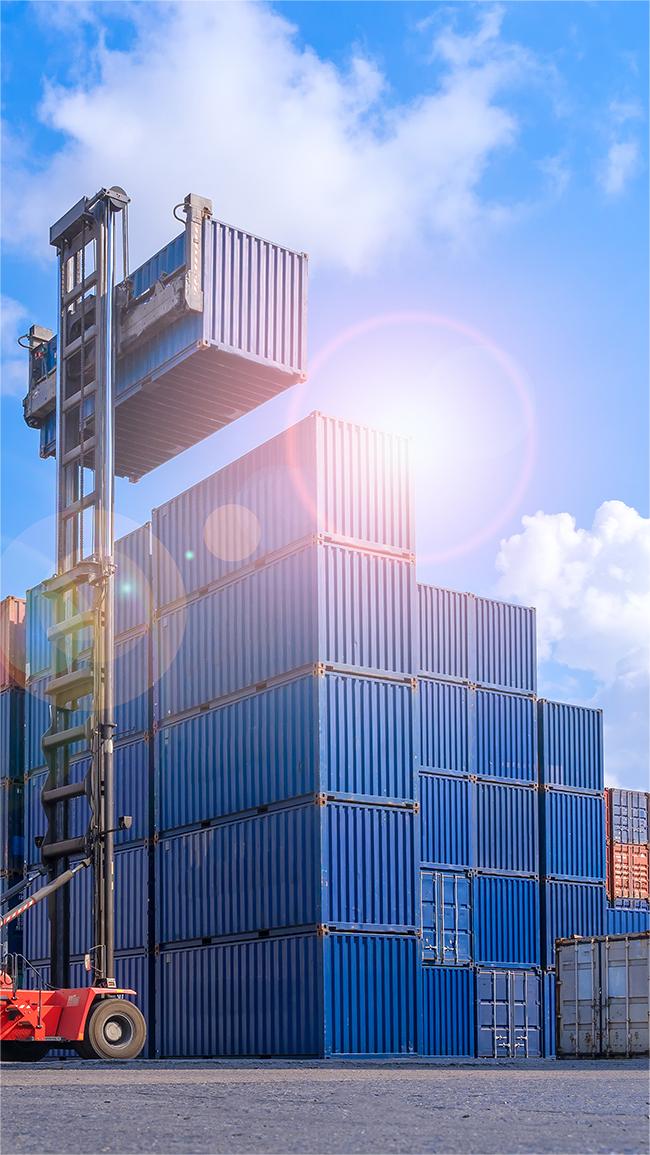Shipping containers stacked at a bustling port in China, ready for international transport.